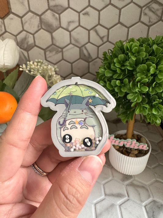 Liquid Shaker: Toto Holding Umbrella